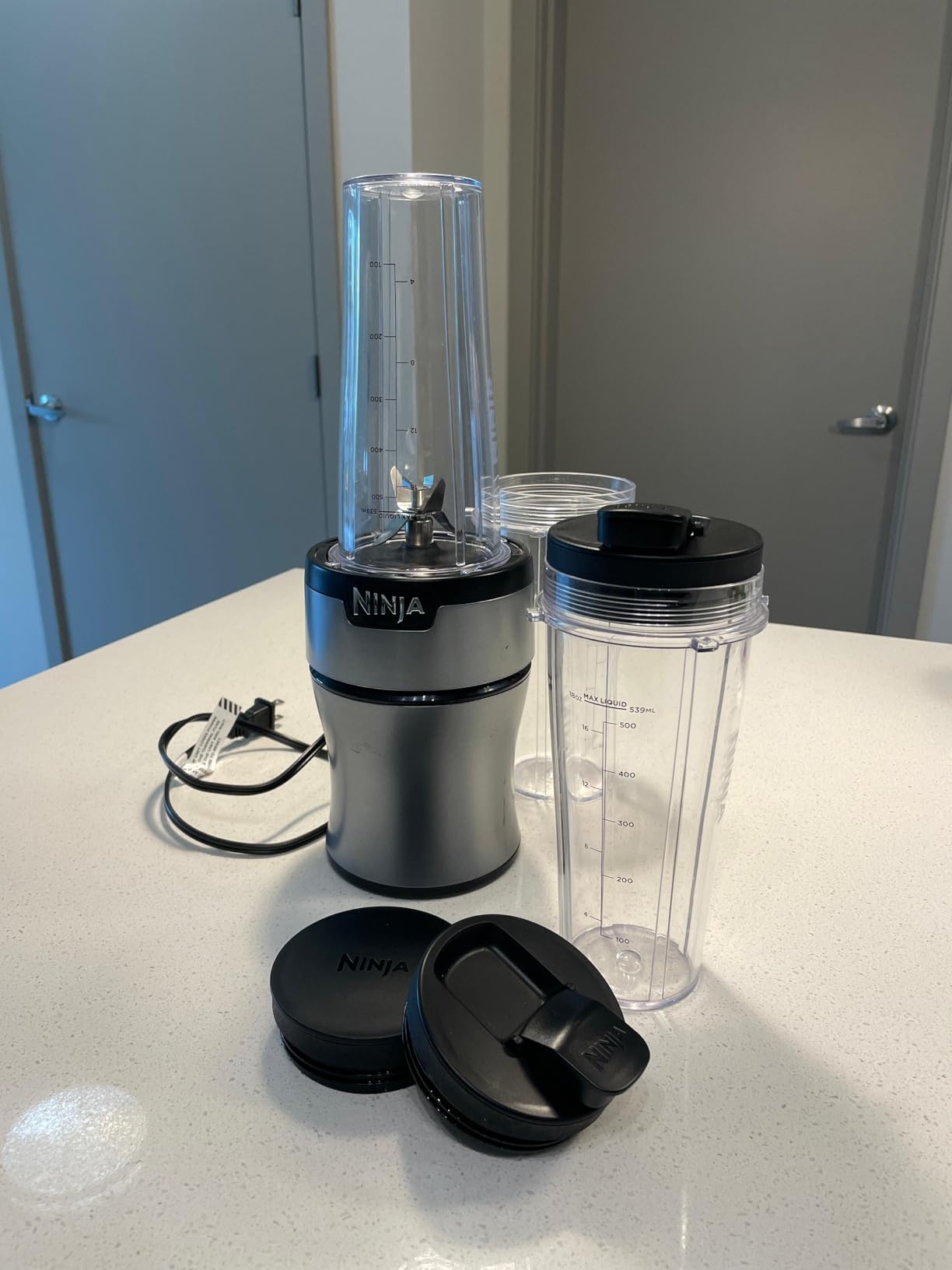 Ninja Fit Compact Personal Blender, Portable Blender for-Smoothies, Shakes, Food Prep, and Frozen Blending, 700-Watt Base, (2) 16-oz. Cups and Spout Lids, Black QB3001SS customer photo 1