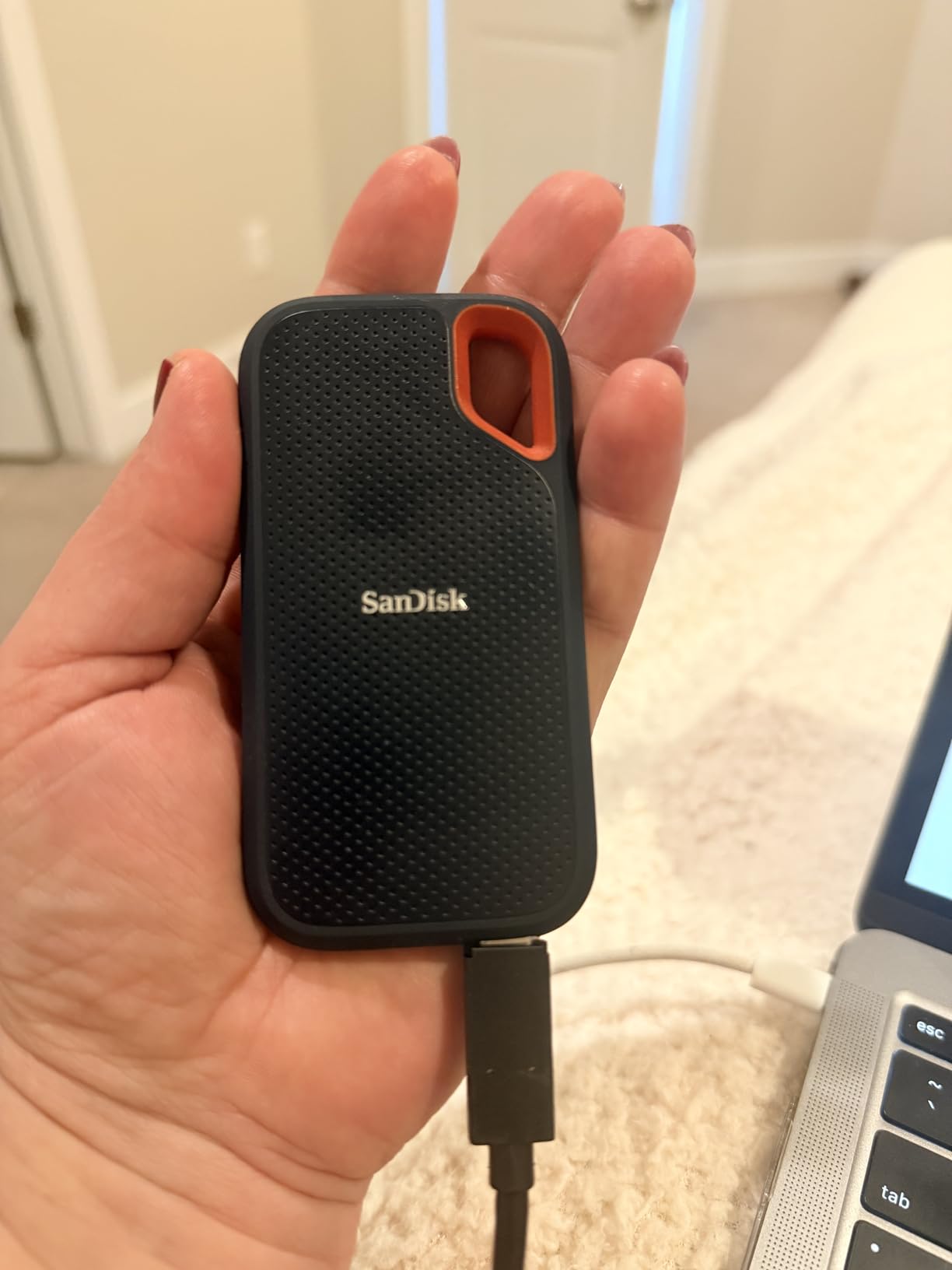 SanDisk 2TB Extreme Portable SSD - Up to 1050MB/s, USB-C, USB 3.2 Gen 2, IP65 Water and Dust Resistance, Updated Firmware - External Solid State Drive - SDSSDE61-2T00-G25 customer photo 1
