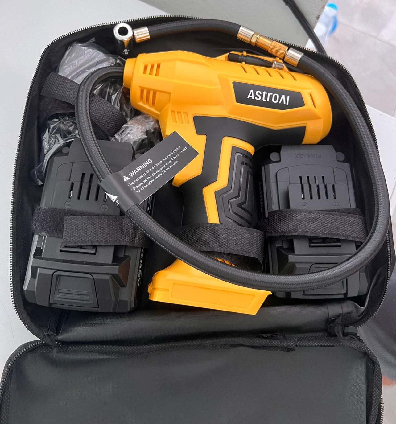 AstroAI Cordless Tire Inflator Air Compressor 20V Rechargeable Battery Powered 160PSI Portable Air Pump with 12V Car Power Adapter Digital Pressure Gauge for Cars Motorcycles JY16P160-18(C2) Yellow customer photo 1