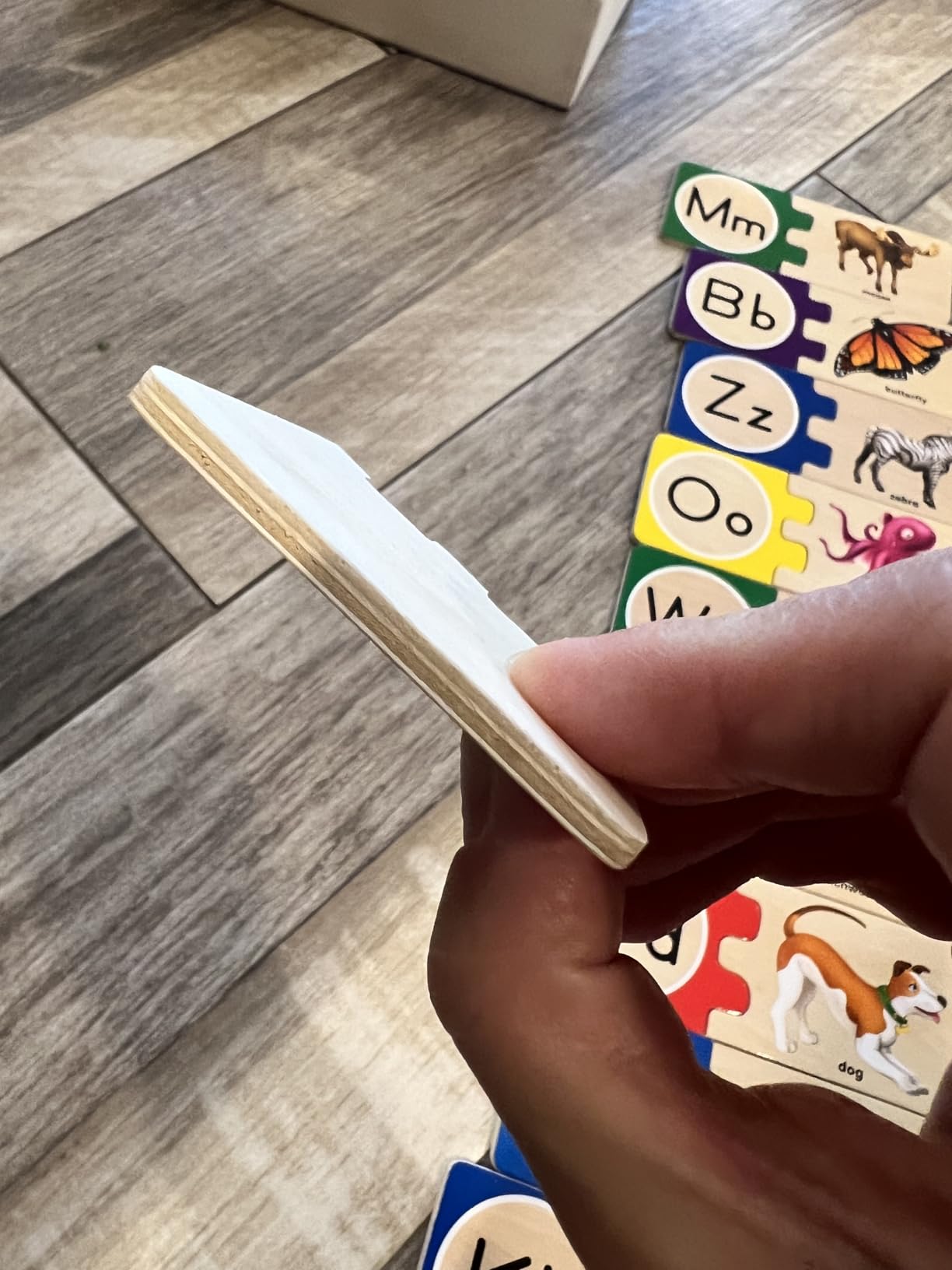 Melissa & Doug Self-Correcting Alphabet Puzzle (52 pcs) with Toy Storage Box customer photo 2