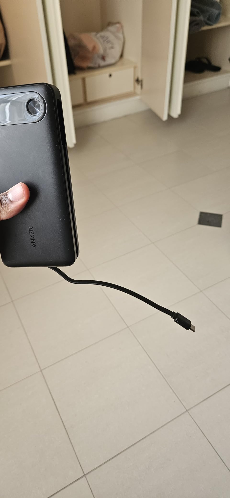 Anker Power Bank, 20,000mAh Travel Essential Portable Charger with Built-in USB-C Cable, 3-Port 87W Max Fast Charging Battery Pack, for MacBook, iPhone 16/15 Series, Samsung, Switch, and More customer photo 1