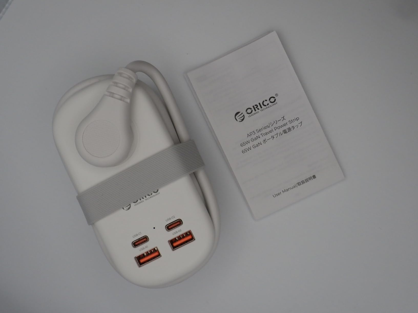 ORICO 65W GaN Travel Power Strip with 7-in-1 Charging Ports (3 AC Outlets/2 USB-A/2 USB-C), Flat Plug and 4FT Extension Cord, Fast Charger for MacBook Pro/Air, iPad Pro, iPhone 17/16/15 -AP3 customer photo 1