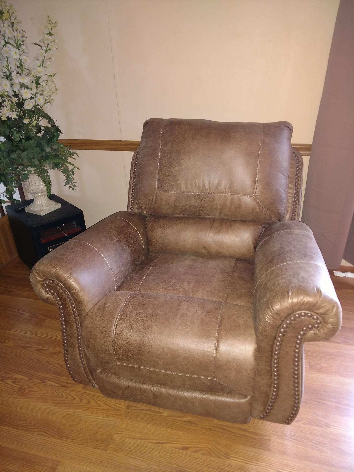 Signature Design by Ashley Larkinhurst Faux Leather Manual Rocker Recliner with Nailhead Trim, Brown customer photo 2