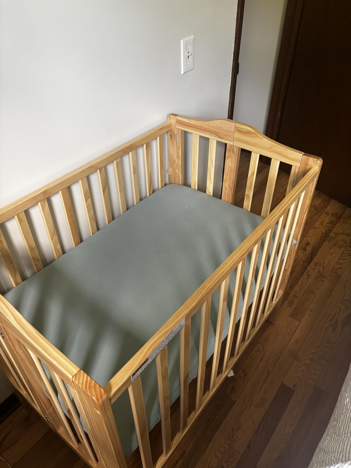 Delta Children Folding Portable Mini Baby Crib with 1.5-inch Mattress - Grey customer photo 1