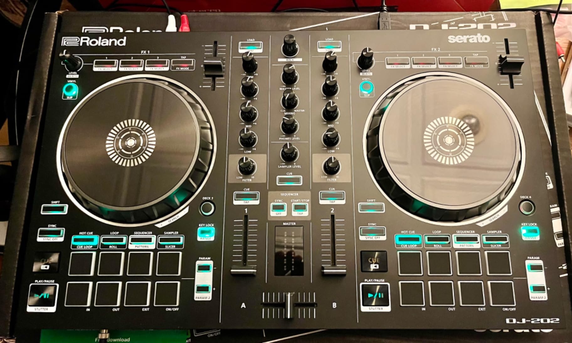 Roland DJ-202 Compact DJ Controller 2-Channel, 4-Deck Controller for Serato DJ Lite with Large, Low-Latency Platters customer photo 1