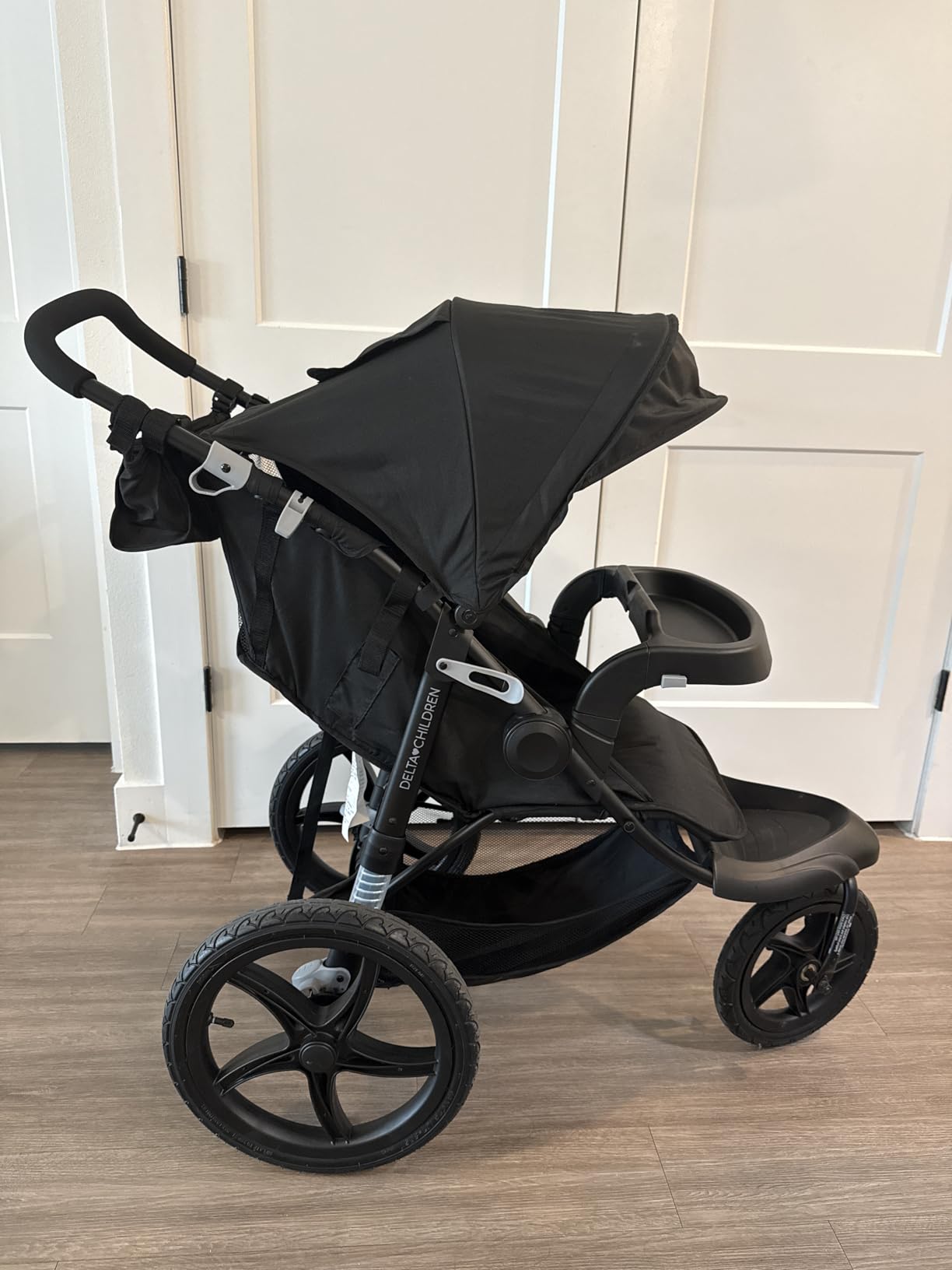 Delta Children Apollo Jogging Stroller - Shock Absorbing Frame with Large Canopy & Recline, Black customer photo 1