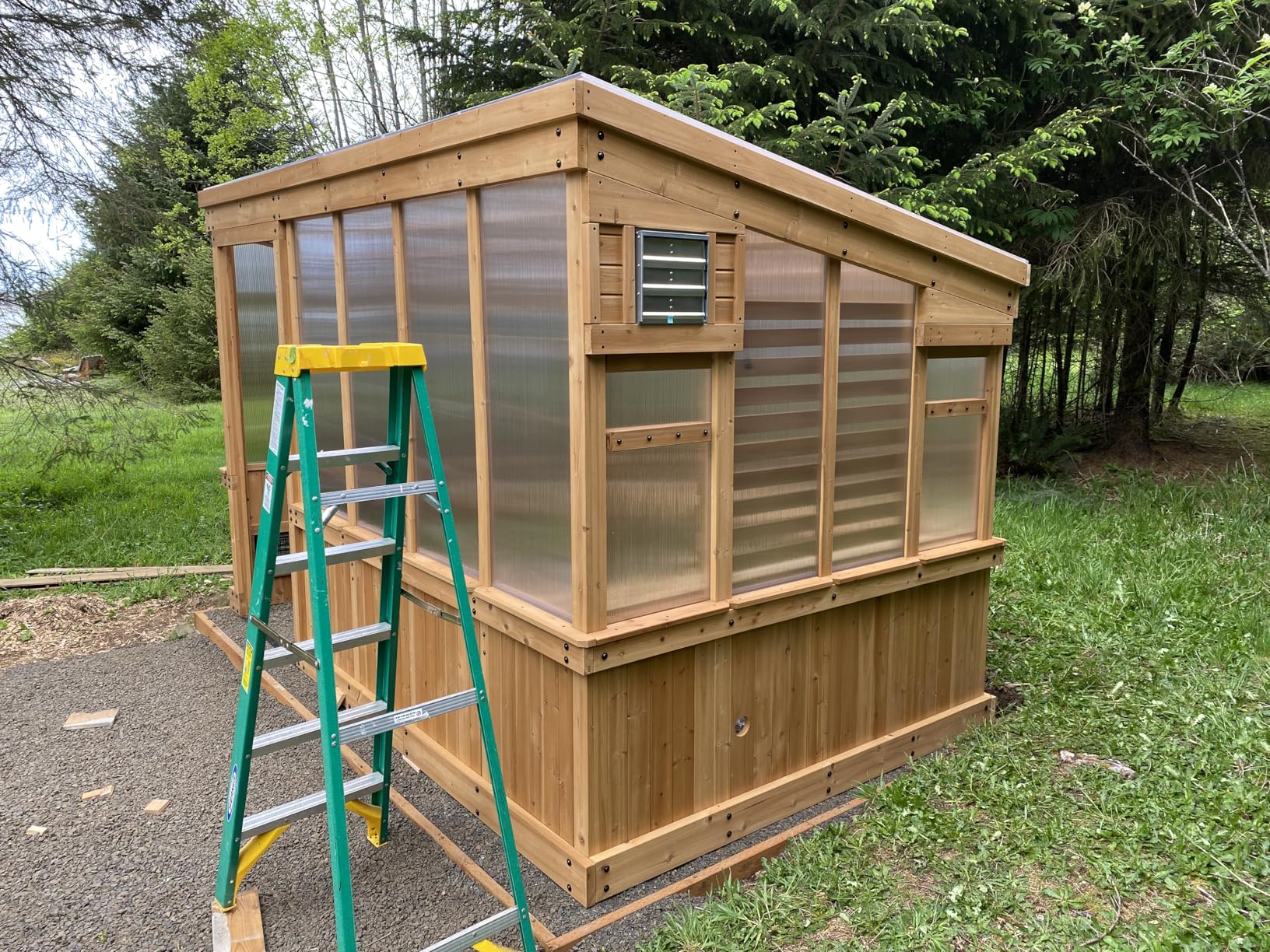 Backyard Discovery Willow 9' x 6' Cedar Wood and Polycarbonate Walk-in Greenhouse Kit with Exhaust Fan, Windows, Hose Hook-Ups, PowerPort customer photo 1