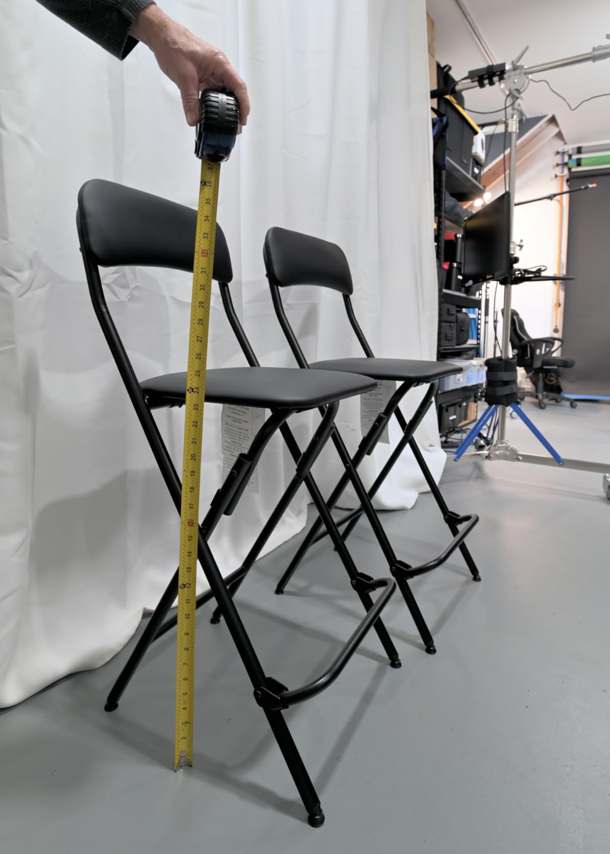 Amazon Basics Folding Bar Stool with Footrest, Portable, Sturdy, Space-Saving Storage, 300lb Capacity, 24
