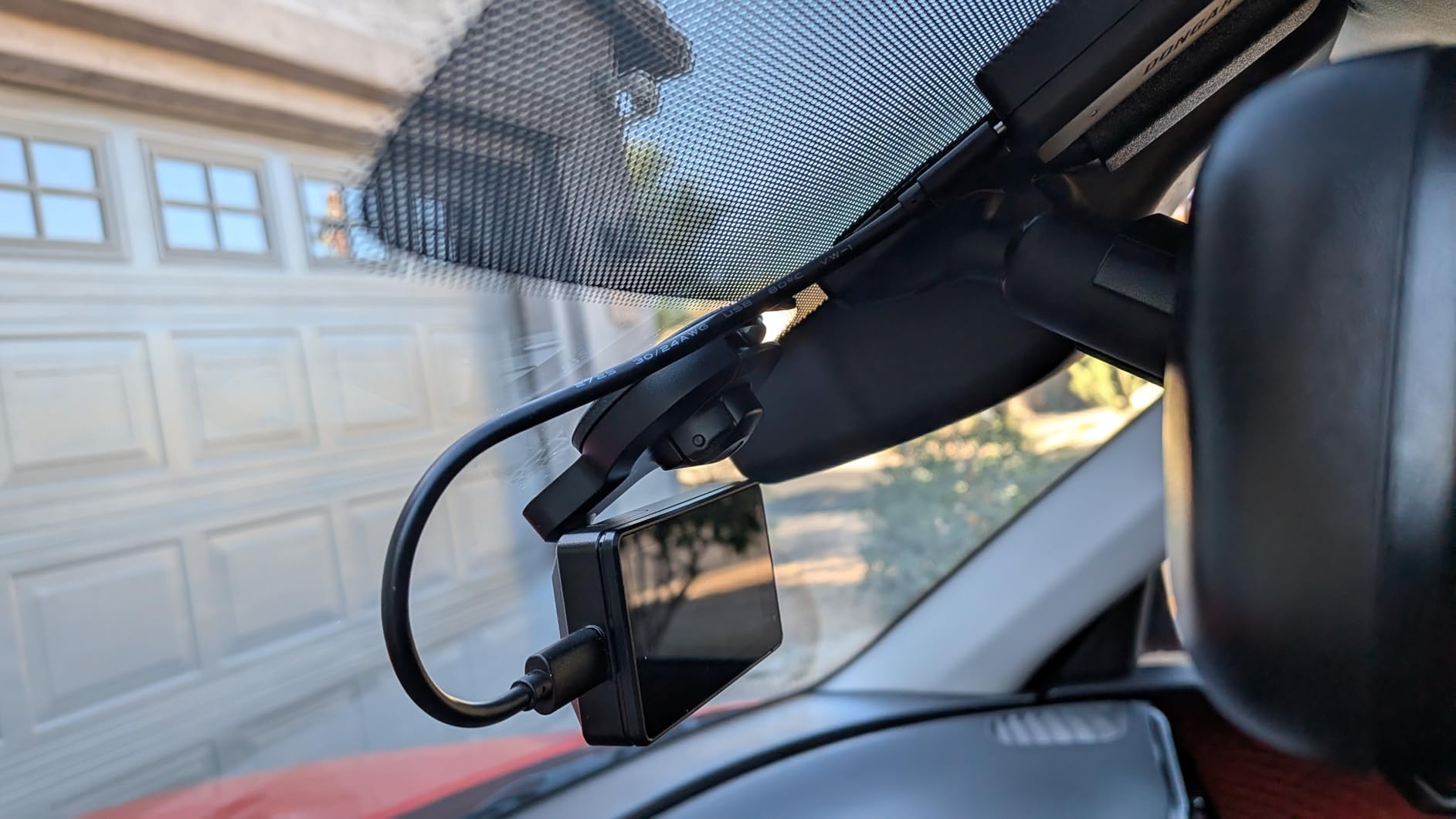 Garmin Dash Cam X110, Compact 1080p HD Dash Cam with a 140-degree Field of View, Built in Clarity Polarizer, Voice Controlled, GPS, 2.4 Display, Automatic Recording customer photo 1