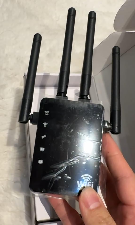 1200Mbps Dual Band (5GHz/2.4GHz) WiFi Extender Signal Booster - 360° 12,880 Sq.ft Coverage, WiFi Extender for 105-Device Support, 1-Tap Setup and One Ethernet Port customer photo 1