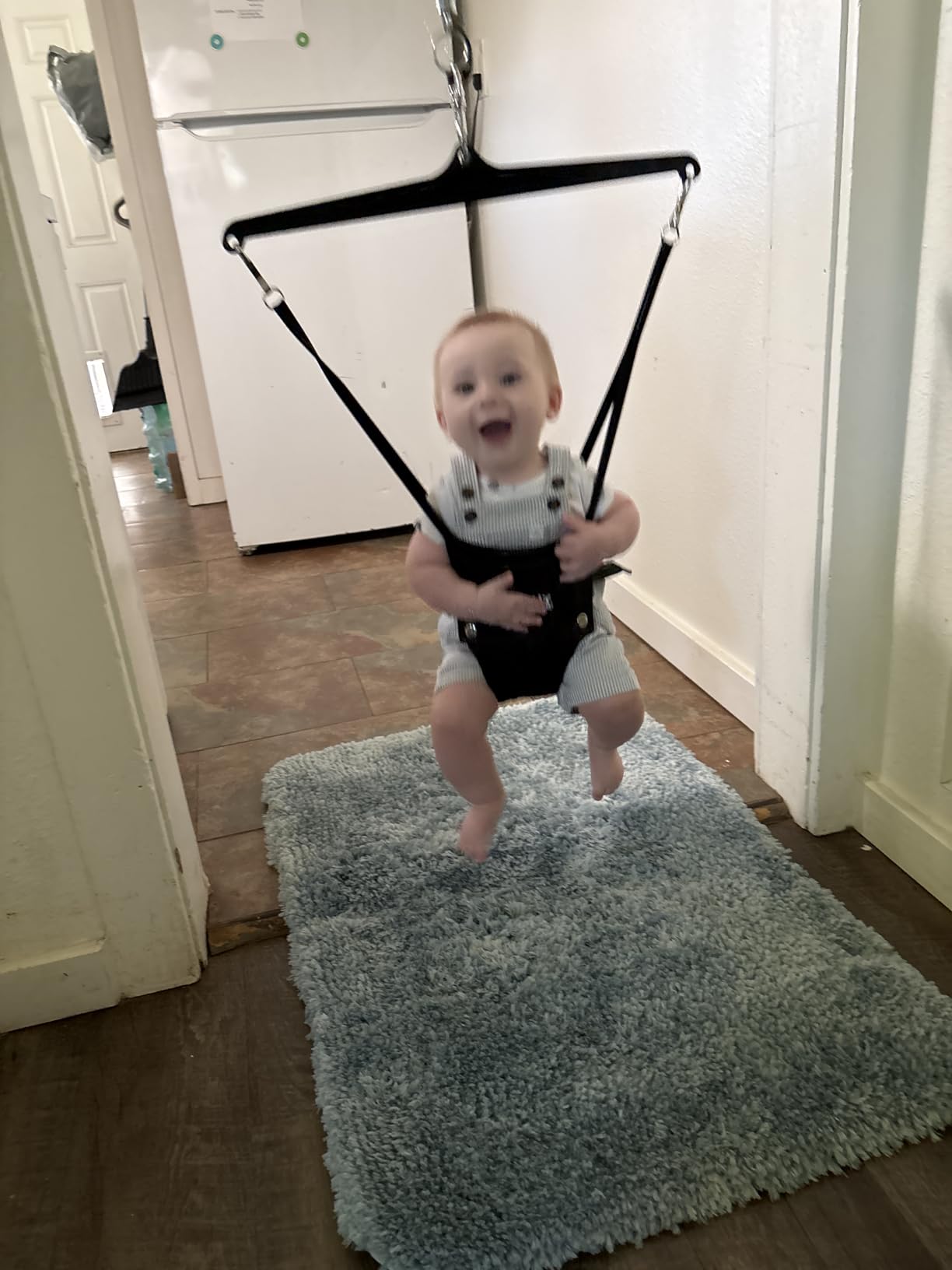 Jolly Jumper Iconic Doorway Baby Jumper - Black | Original Doorway Baby Jumper, Indoor Exercise Saddle Seat, Adjustable Height, for Infants up to 28lbs, No Stand Required customer photo 2