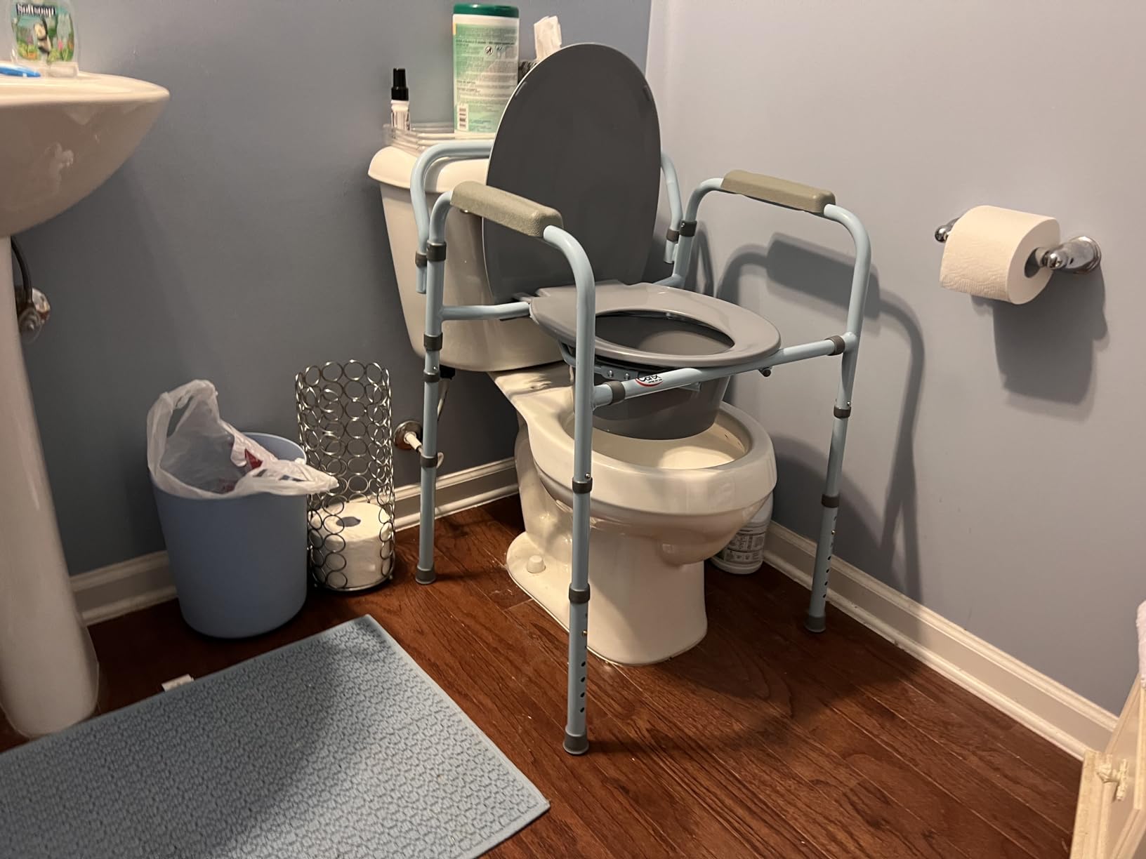 Carex 3-in-1 Folding Bedside Commode and Raised Toilet Seat, Portable Toilet Supports Up to 300lbs, Bedside Commodes for Seniors, Adult Potty Chair with Bucket, Lid, and Splash Guard customer photo 1