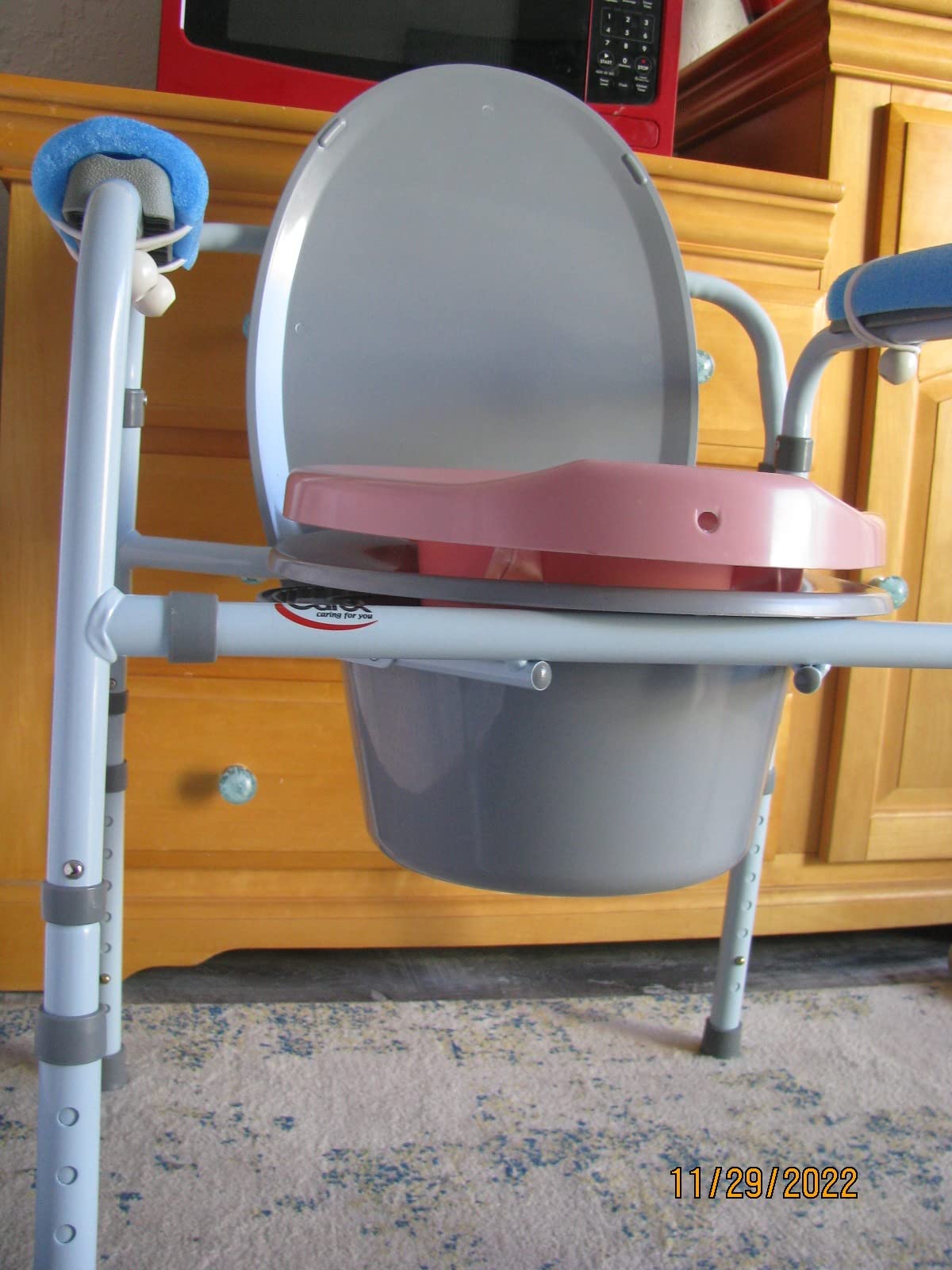 Carex 3-in-1 Folding Bedside Commode and Raised Toilet Seat, Portable Toilet Supports Up to 300lbs, Bedside Commodes for Seniors, Adult Potty Chair with Bucket, Lid, and Splash Guard customer photo 2