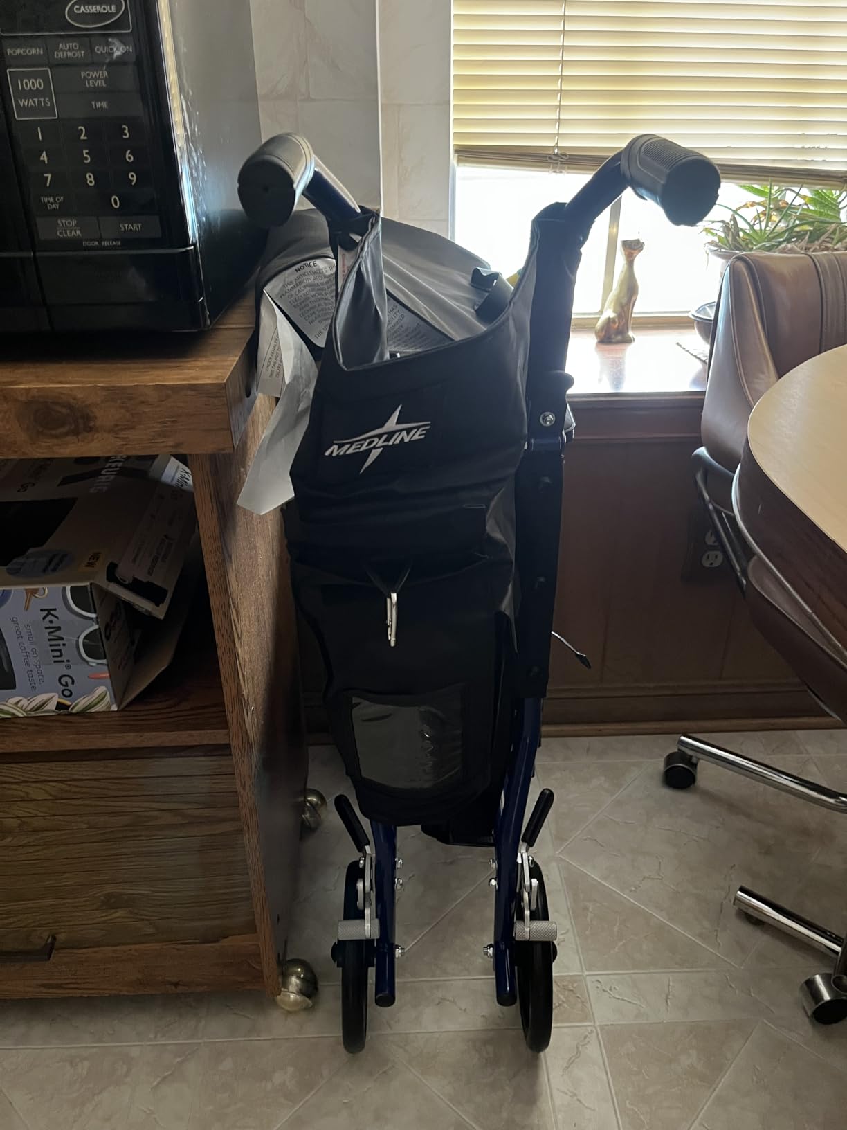 Medline Ultra Lightweight Transport Wheelchair for Adults, Foldable, 19-Inch Seat Width, Blue Frame, Black Upholstery customer photo 1