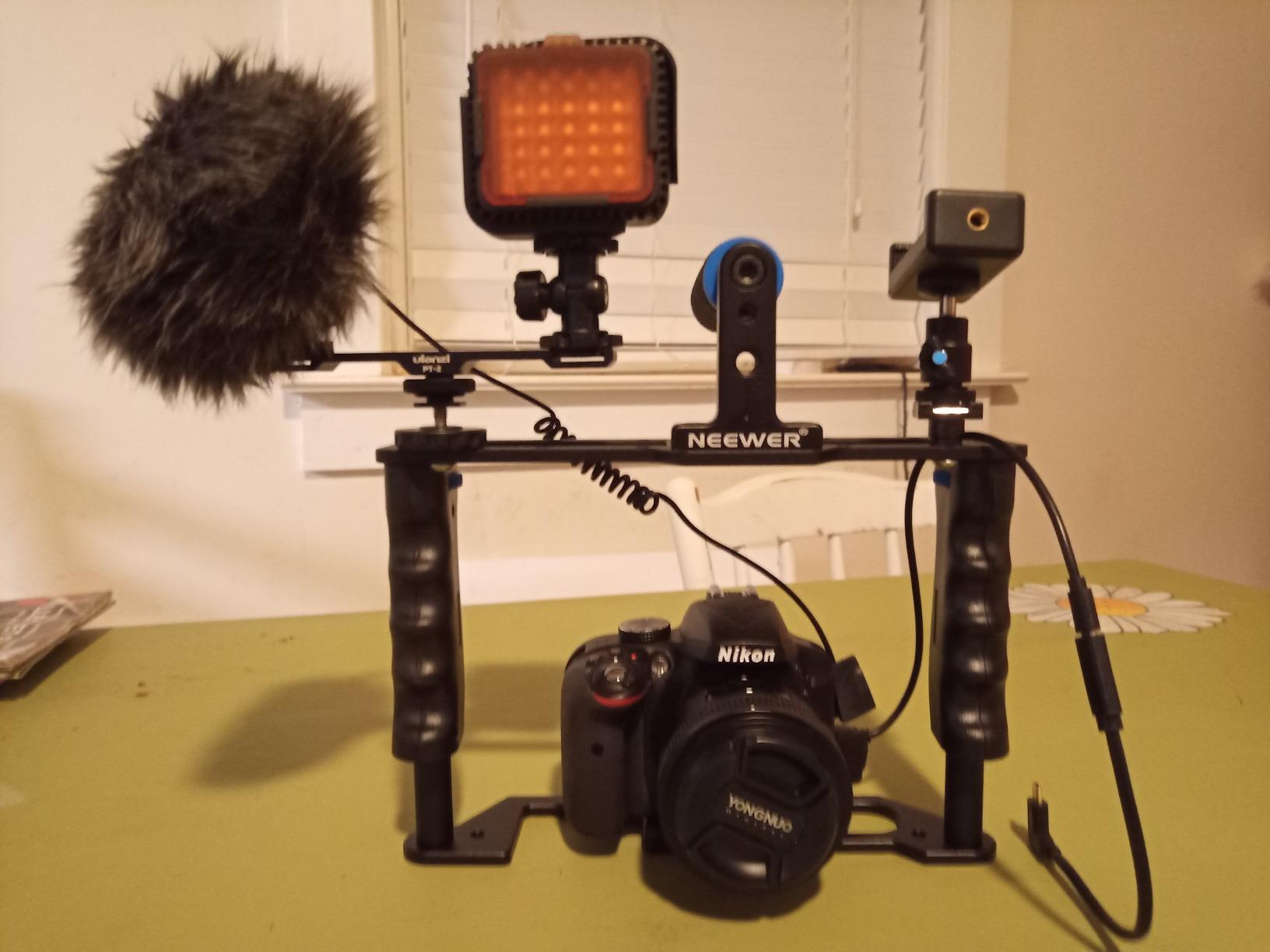 NEEWER Camera Video Cage Film Movie Making Kit, Aluminum Alloy with Top Handle, Dual Hand Grip, Two 15mm Rods, Compatible with Canon Sony Fujifilm Nikon DSLR Camera and Camcorder (Black + Blue) customer photo 2