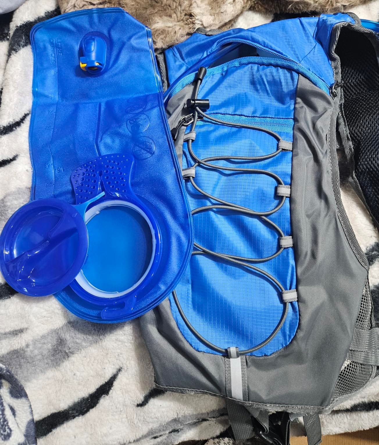 Unigear Hydration Pack Backpack with 2L Water Bladder for Hiking & Cycling | Lightweight Water Backpack For Running, Biking, Climbing And Camping, 70 Oz Bladder, Hydration Backpack For Hiking customer photo 1