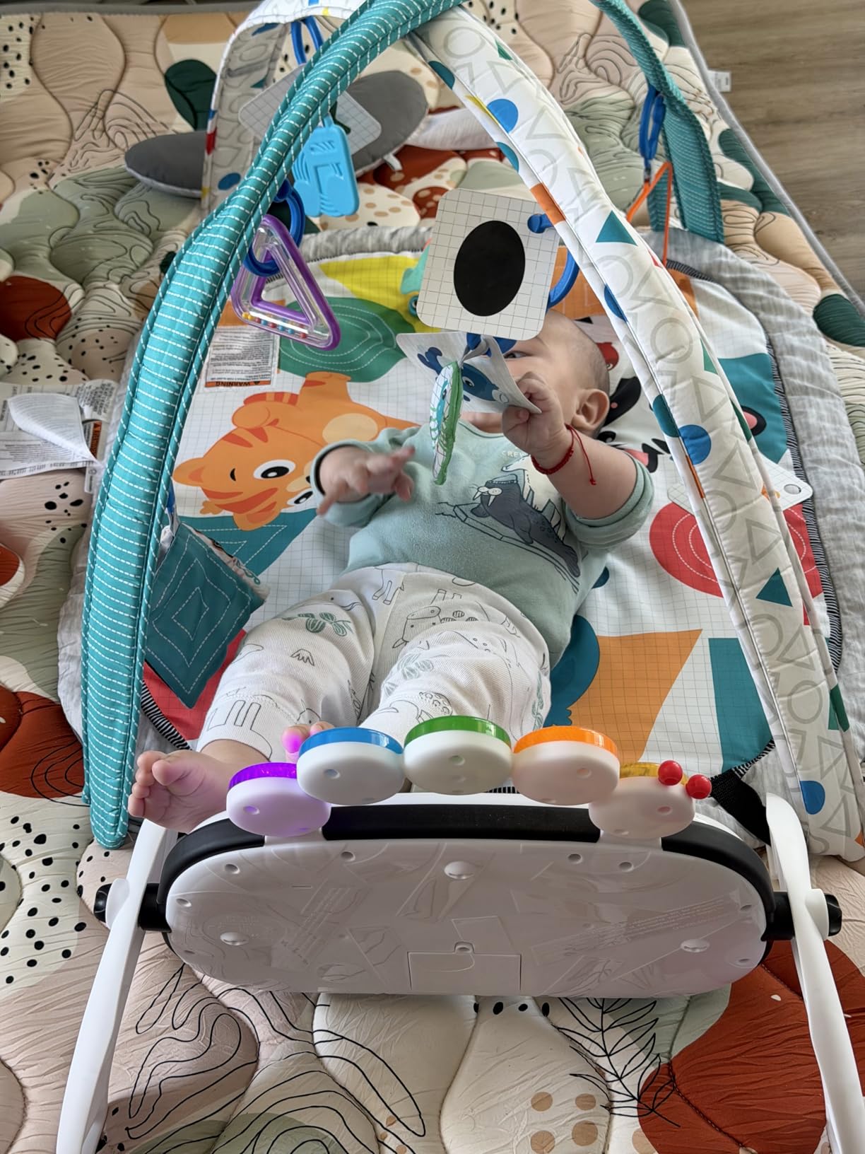 Baby Einstein 4-in-1 Kickin' Tunes Music and Language Play Gym and Piano Tummy Time Activity Mat customer photo 2