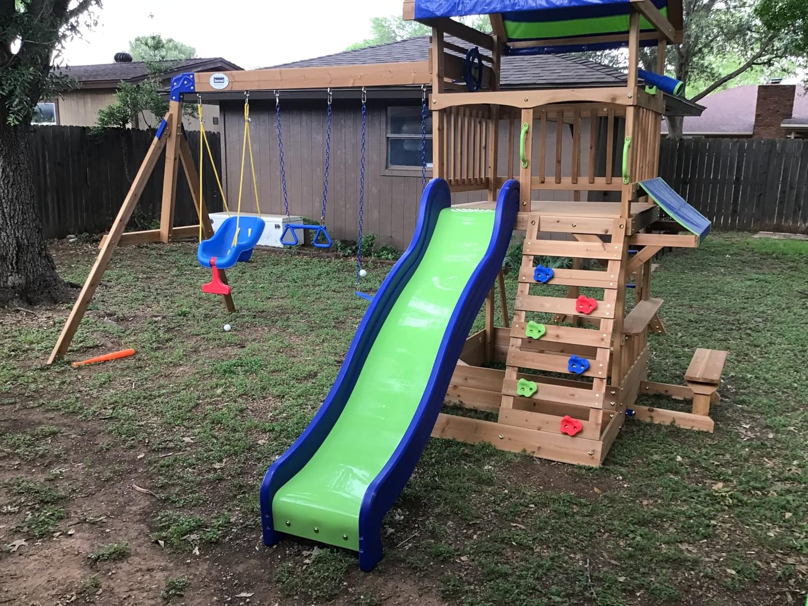 Backyard Discovery Belmont Cedar Wood Swing Set with Wave Slide, Play Deck, Rock Wall Ladder, Snack Bar Window, Shaded Picnic Area, Bench, Belt Swings, Trapeze, Sandbox Area, Canopy, Outdoor Playset customer photo 1