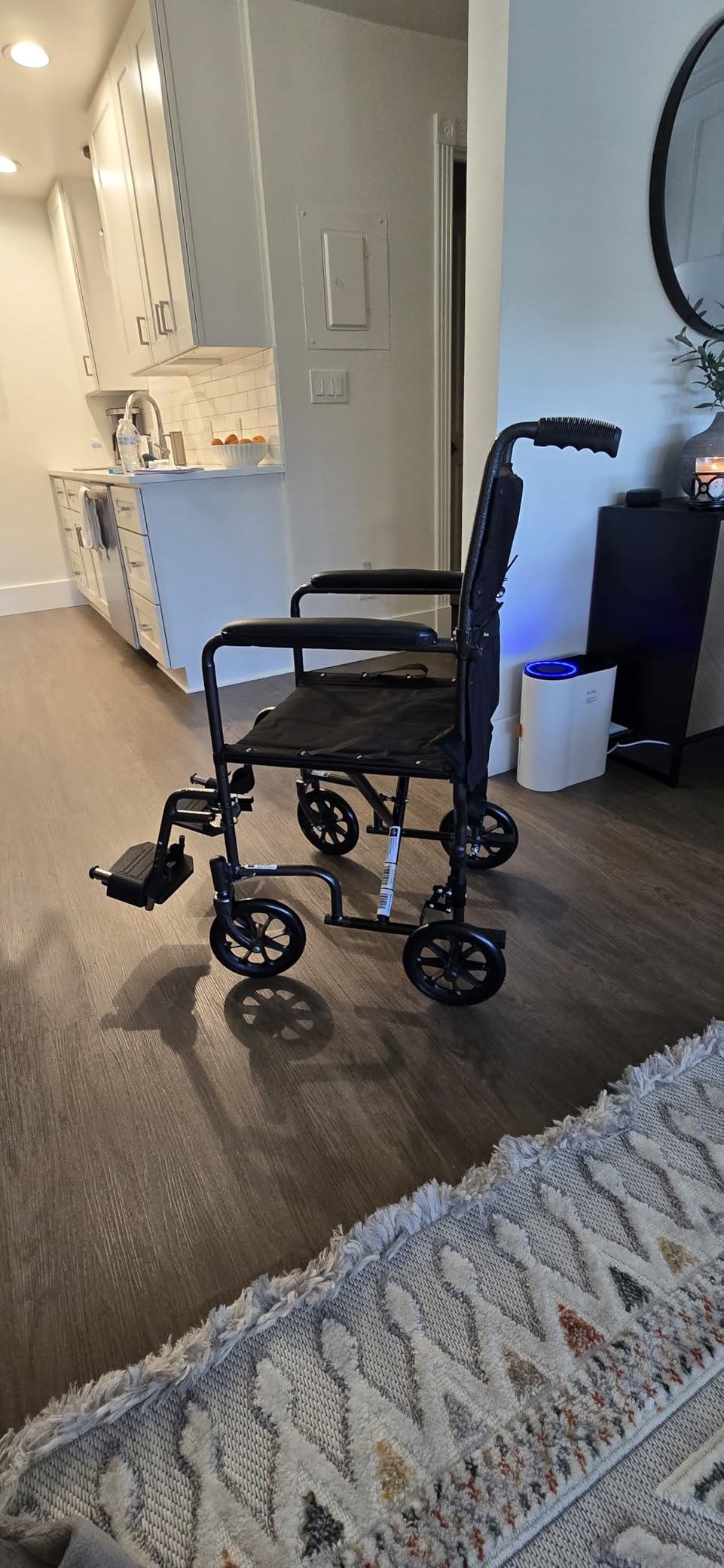 Medline Durable Folding Steel Transport Wheelchair with Swing-Away Footrests, 19-Inch Seat Width, Black Frame, Black Upholstery customer photo 2