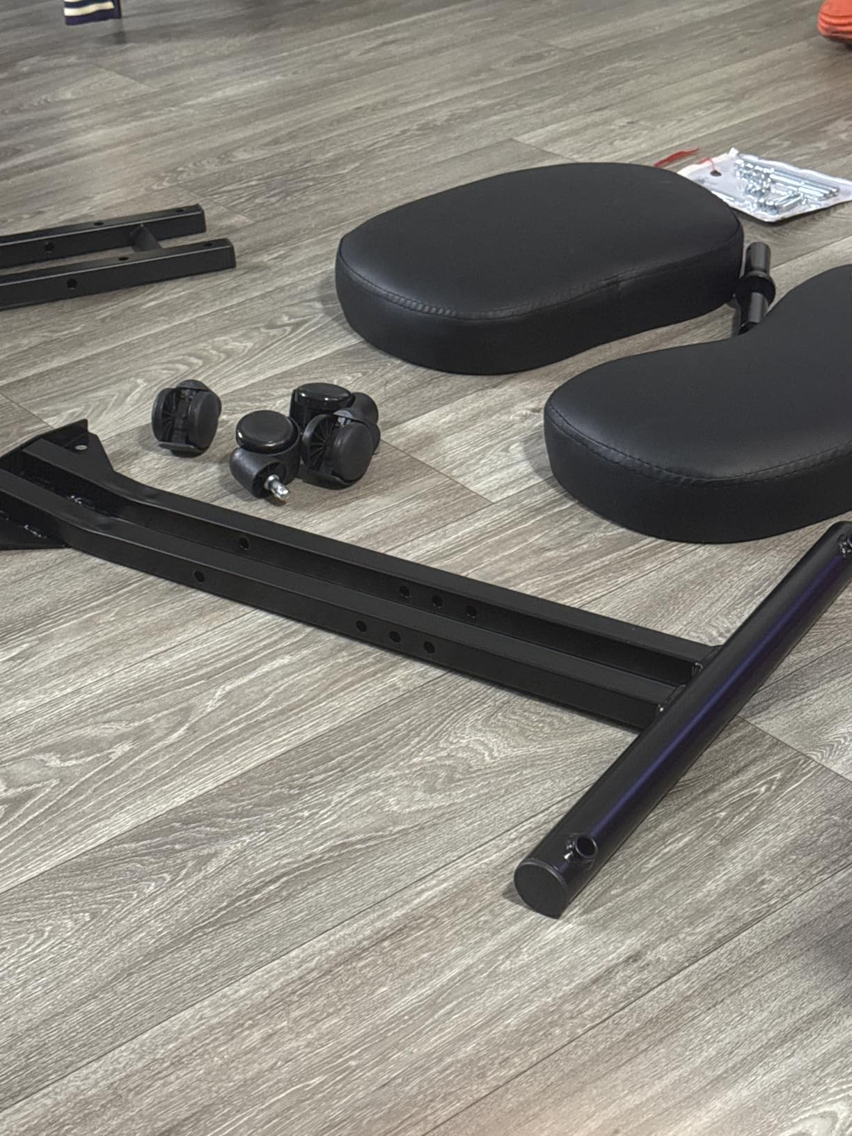 Yaheetech Ergonomic Kneeling Chair, Adjustable Rolling Knee Stool, Black - Thick foam cushions in faux leather support an upright posture; the metal frame tilts 91-130 degrees and rolls on casters customer photo 2