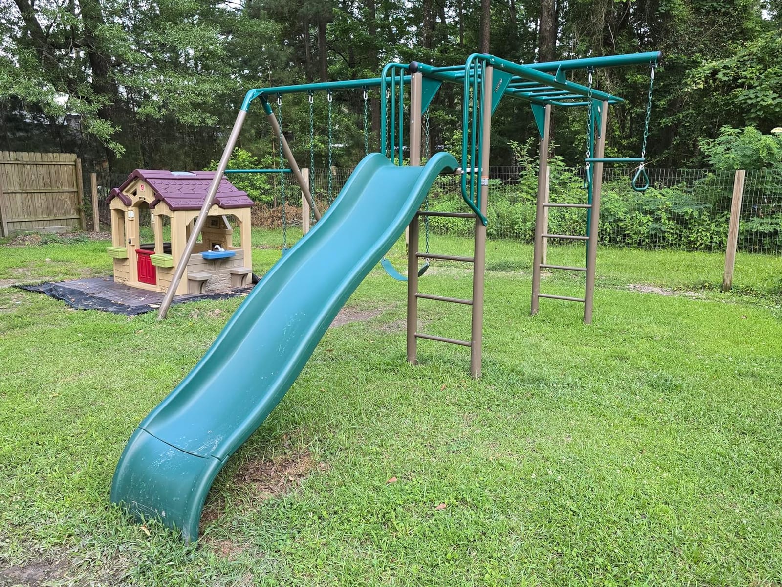 Lifetime 91028 Monkey Bar Adventure Swing Set with 3 Swings, Trapeze Bar, 9-Foot Slide and Fireman's Pole, Earthtone customer photo 2