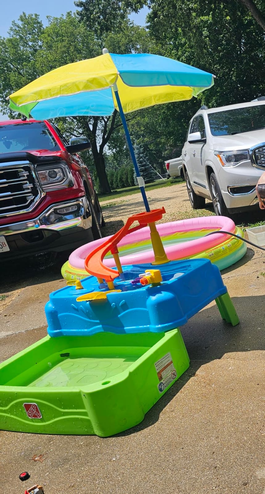 Step2 Waterpark Wonders Two Tier Water Table, Kids Water Activity Sensory Playset with Umbrella, Garden Hose Sprinkler Attachment, 11 Piece Accessories, Outdoor Summer Toy, Ages 18 Months+, Blue customer photo 1
