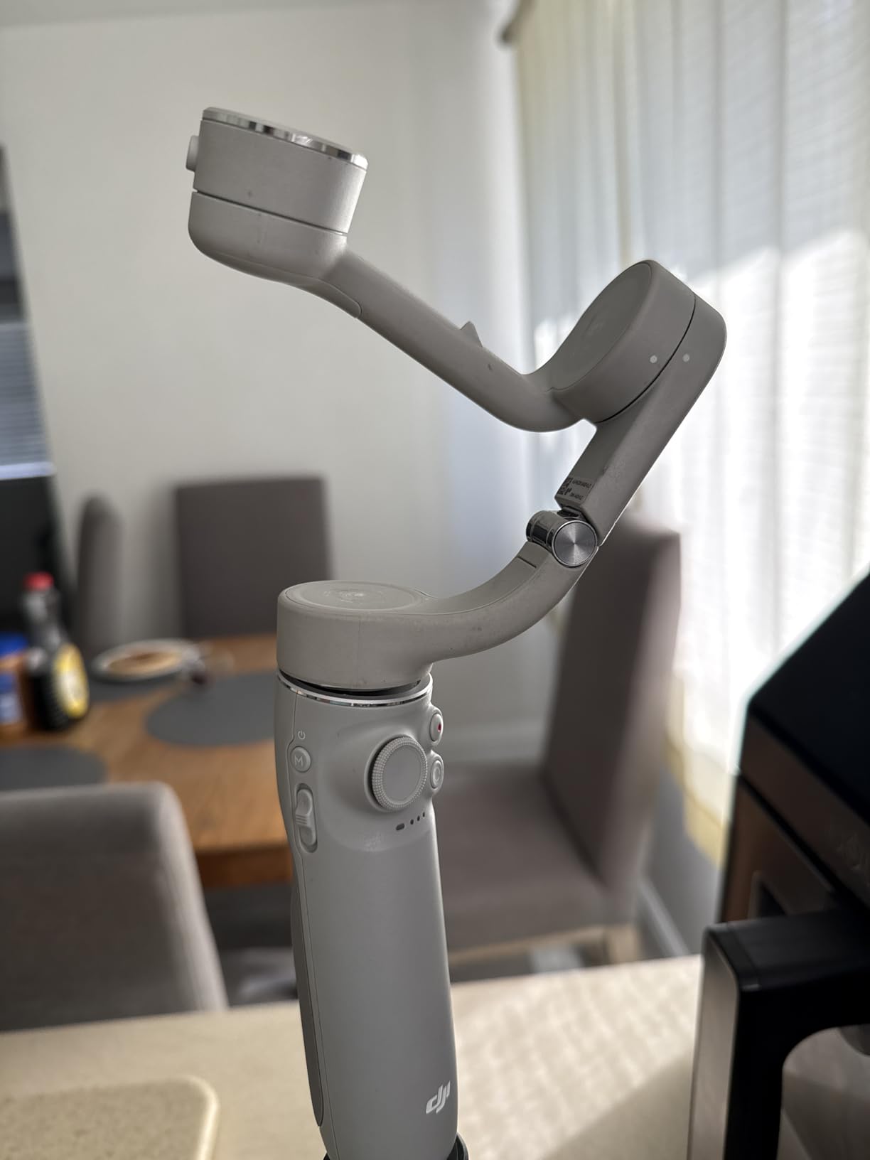 DJI OM 5 Smartphone Gimbal Stabilizer, 3-Axis Phone Gimbal, Built-In Extension Rod, Portable and Foldable, Android and iPhone Gimbal with ShotGuides, Vlogging Stabilizer, YouTube TikTok Video, Gray customer photo 1