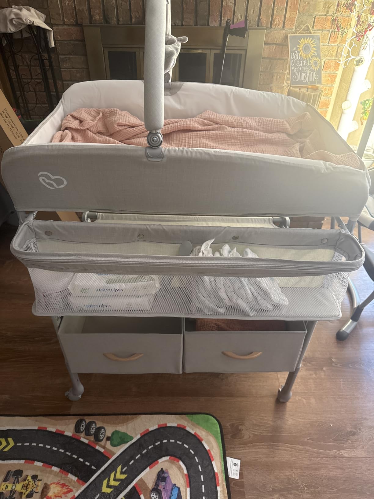 BabyBond Portable Baby Changing Table with 2 Storage Baskets (Beige) | Large Storage Foldable Changing Table for Infant and Newborn, Height Adjustable Diaper Changing Table with Lockable Wheels customer photo 1