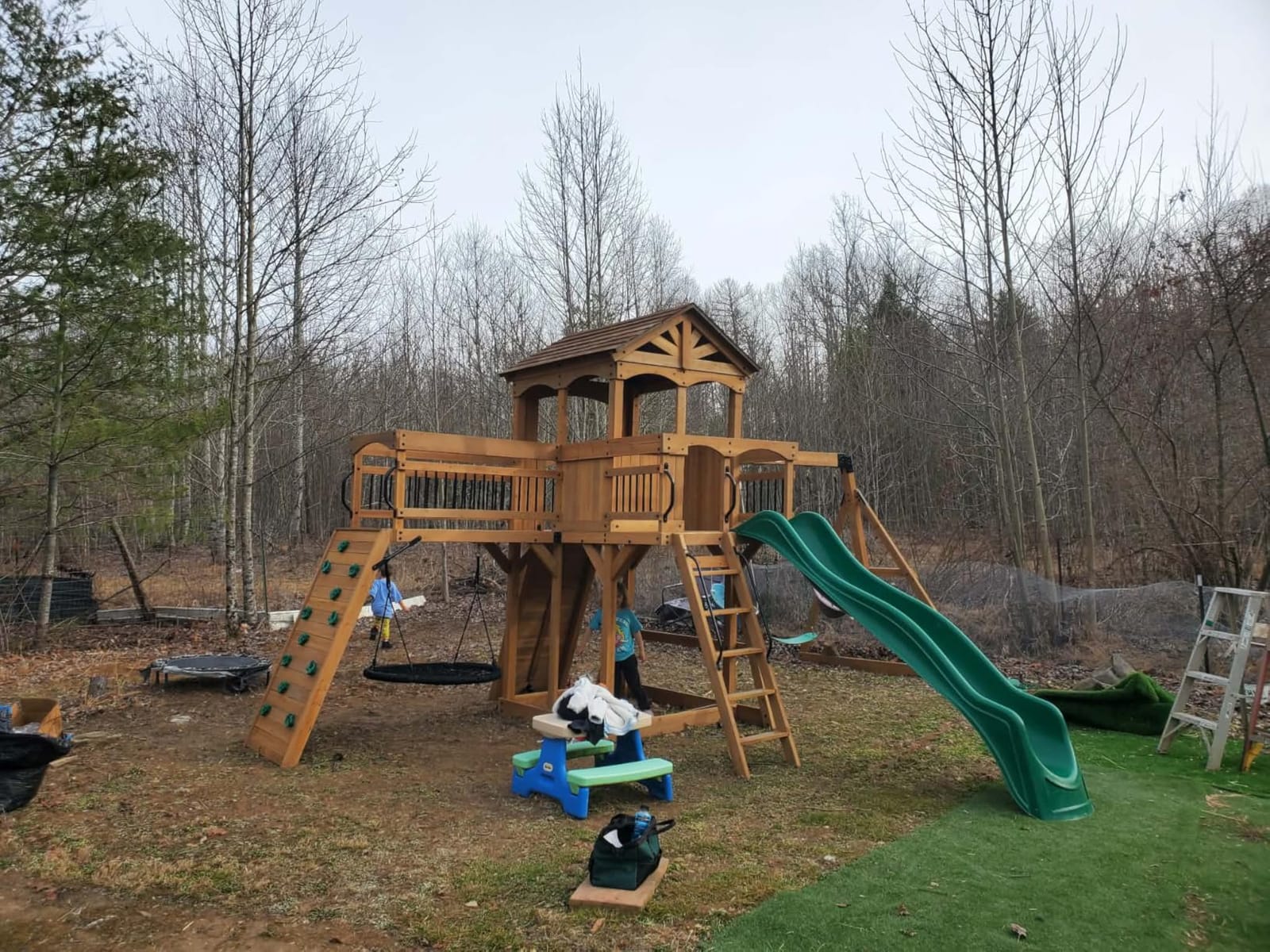 Backyard Discovery Sterling Point Cedar Wood Swing Set with Wave Slide, Raised Clubhouse, Wooden Bridge, Rock Wall, Belt Swings, Web Swing, Trapeze, Balcony, Climbing Wall, Ladder, Outdoor Playset customer photo 2