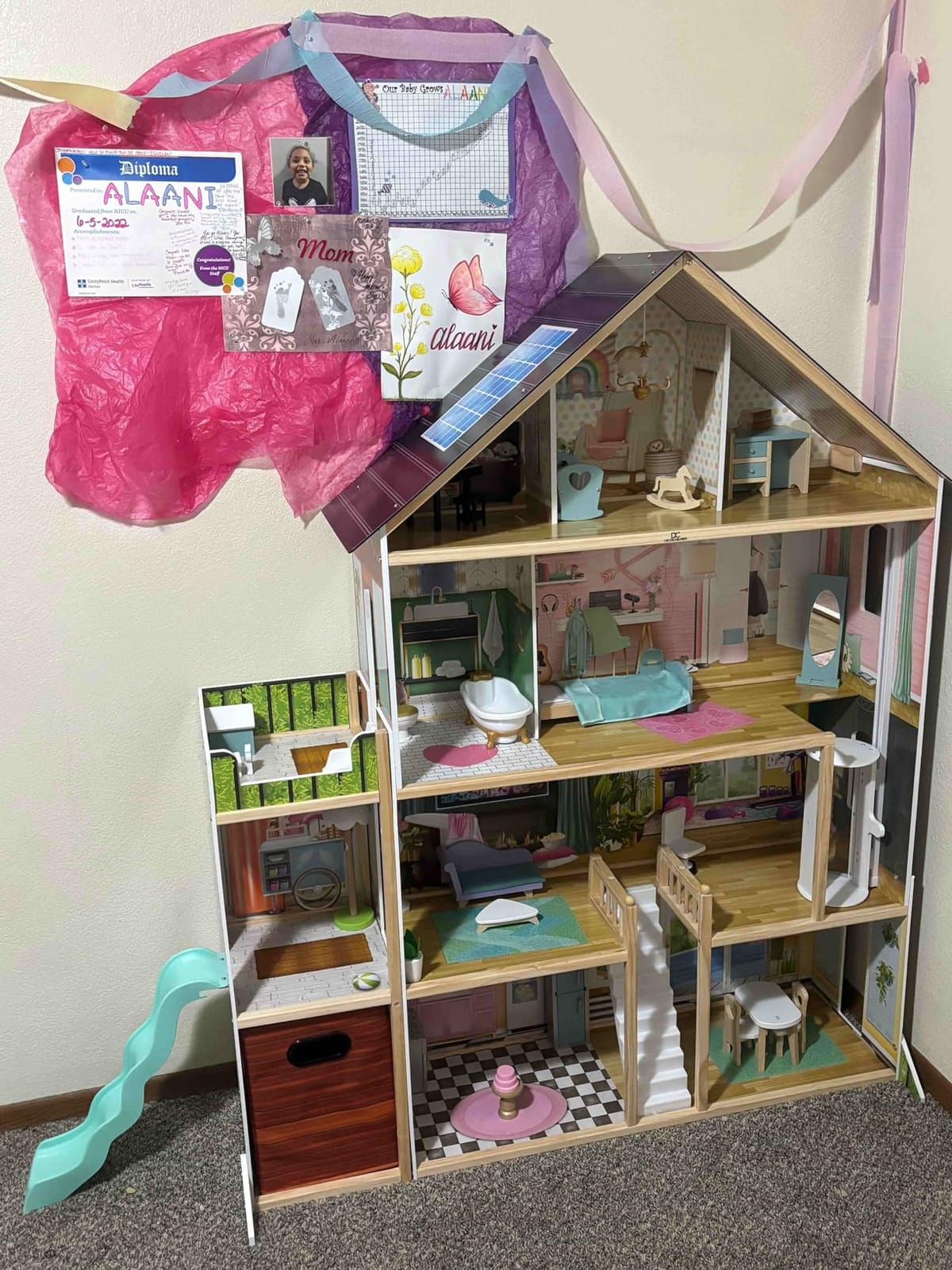 Delta Children Deluxe Maui Dollhouse - Large 4-Story Dollhouse with 12 Rooms Includes 50 Accessories - Working Elevator, Wave Slide, Lights/Sounds - Fits 12-inch Dolls - Pretend Play Gift for Ages 3+ customer photo 1