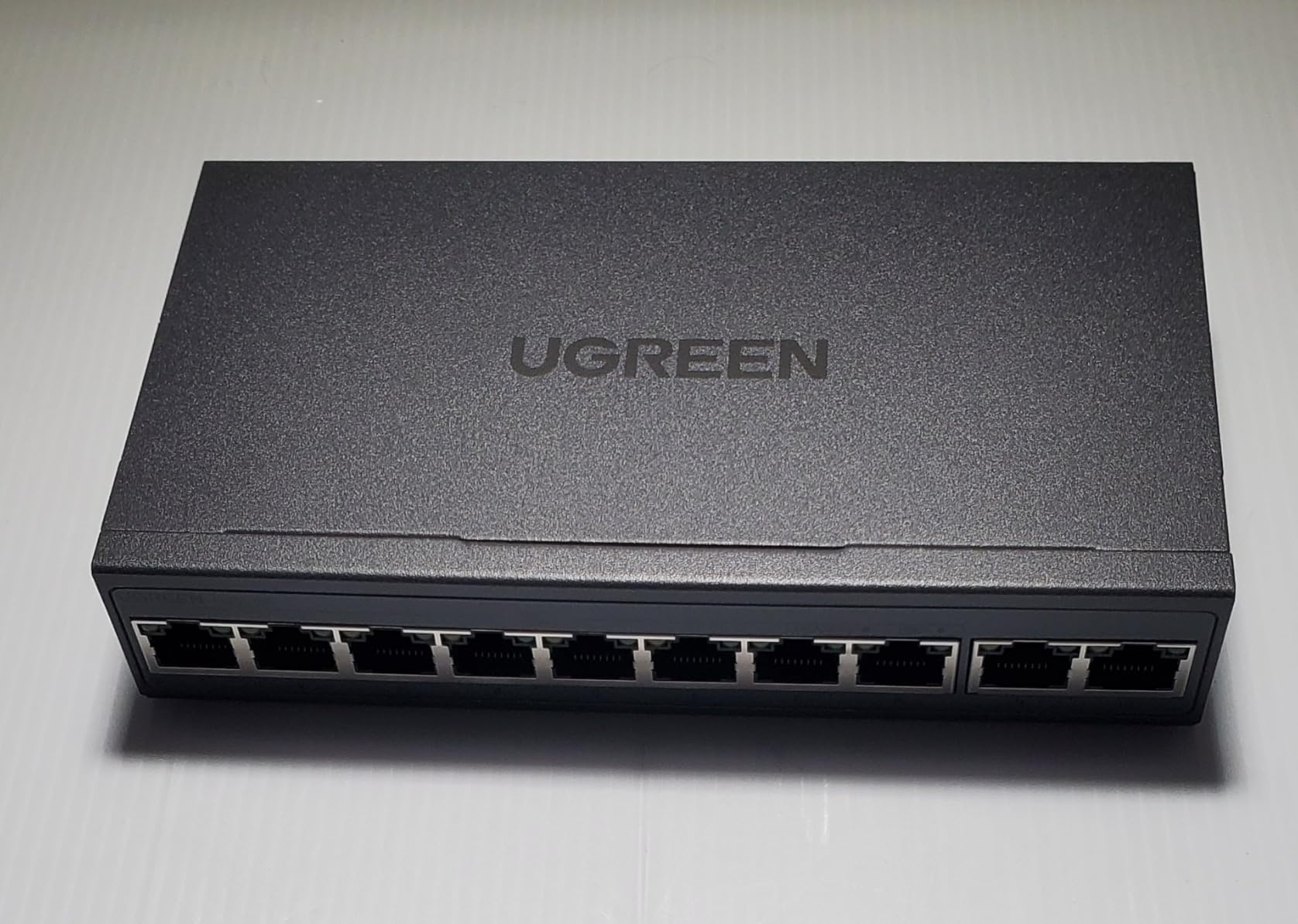 UGREEN Ethernet Switch, 10-Port PoE Switch, 8 PoE+@60W + 2 Gigabit Uplink | Plug & Play, Standard/Port Isolation(VLAN)/Extend Mode, PoE Auto Recovery, Metal Unmanaged Network Hub for Security Camera customer photo 2