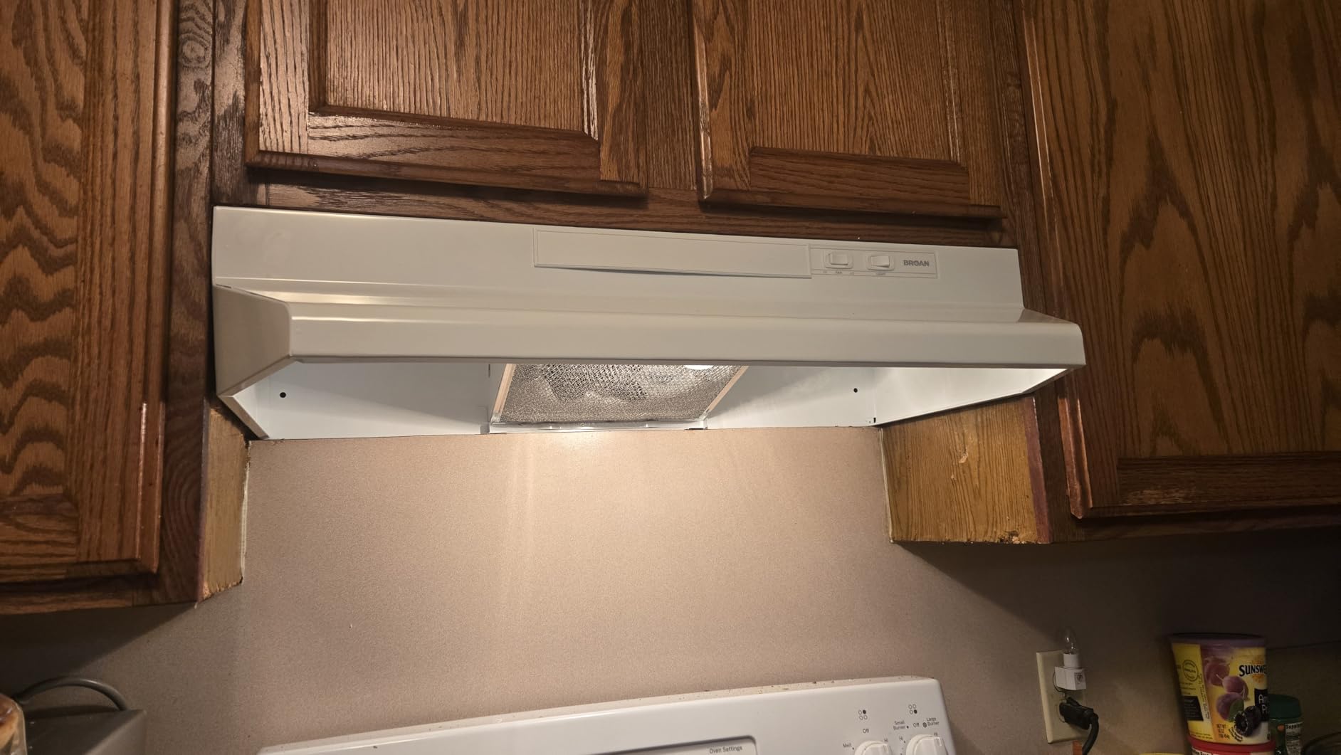 Broan-NuTone F403011 Insert with Light, Exhaust Fan for Under Cabinet Two-Speed Four-Way Convertible Range Hood, 30-Inch, White on White customer photo 1