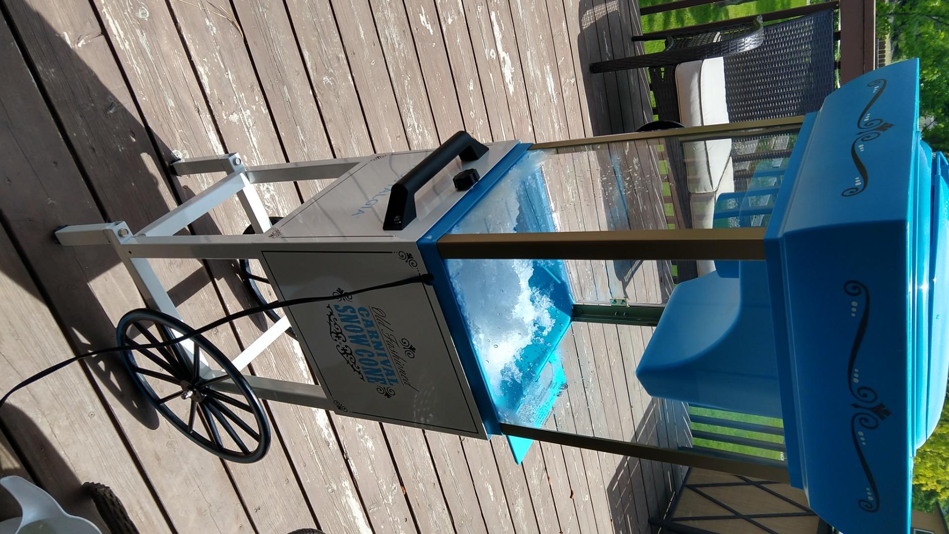 Nostalgia Snow Cone Shaved Ice Machine - Retro Cart Slushie Machine Makes 48 Icy Treats - Includes Metal Scoop, Storage Compartment, Wheels for Easy Mobility - White, Blue customer photo 2