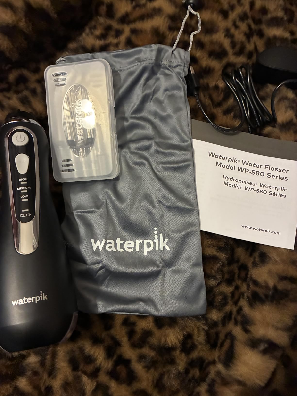 Waterpik Cordless Advanced Portable Water Flosser, Rechargeable, White | 3 Settings, 4 Tips, Travel Bag, for Gums, Teeth, Dental Braces, Implants, Shower Use ADA Accepted WP-580 Packaging May Vary customer photo 1