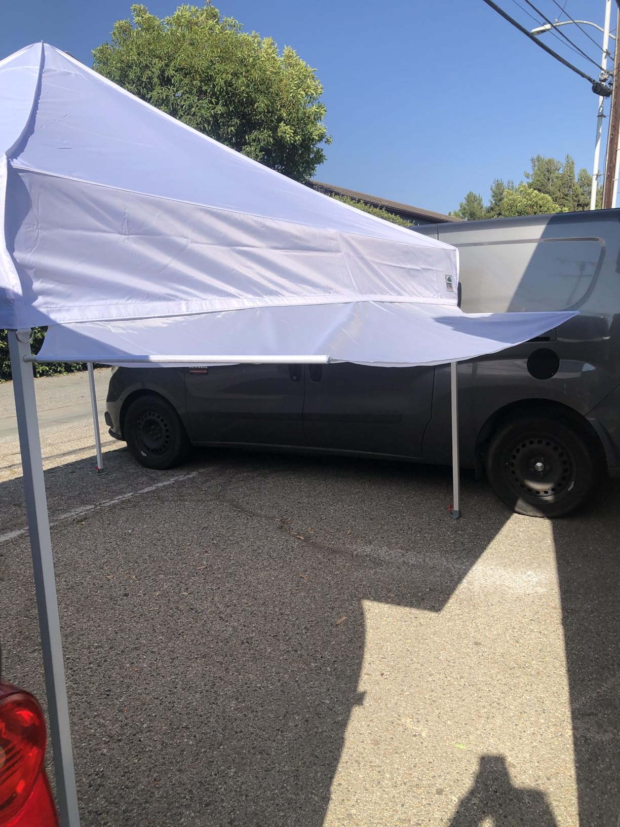 Eurmax USA 10x10 Pop Up Canopy,Commercial Tent with Patented No-Tip Rolling Bag,30sqft Extension Awning & 4 Zippered Removable Walls,UV & Water Resistant,Heavy Duty Instant Shelter Gazebo,White customer photo 1