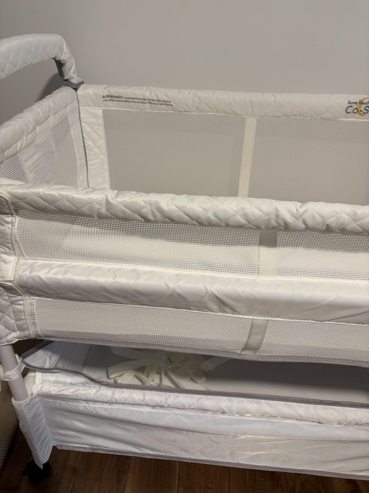 Arm’s Reach Clear-Vue Co-Sleeper Bedside Bassinet Featuring Clear Mesh Panels with Fold-Down Side, Large Attached Storage Basket, 4 Wheels, and Height-Adjustable Legs, White customer photo 1