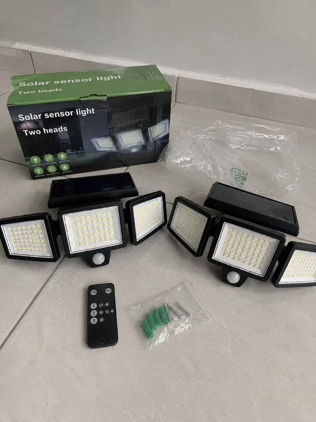 Tuffenough Solar Outdoor Lights 2500LM 210 LED Security Lights with Remote Control,3 Heads Motion Sensor Lights, IP65 Waterproof,270° Wide Angle Flood Wall Lights with 3 Modes(2 Packs) customer photo 1