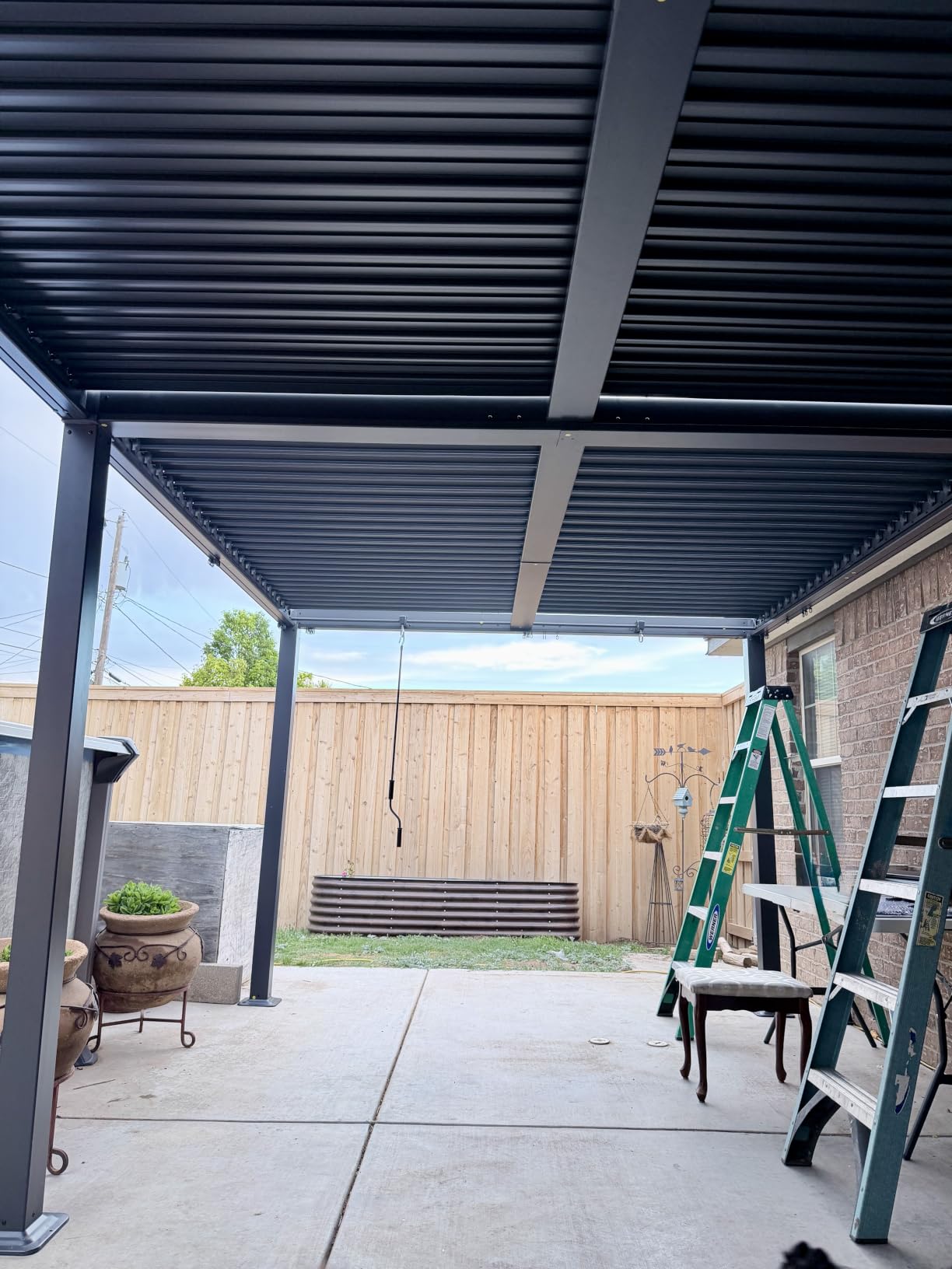 EROMMY Louvered Pergola 10x20, Outdoor Aluminum Pergola with Adjustable Rainproof Roof for Garden, Patio, Deck, Waterproof Curtains and Netting Included, Gray-Black customer photo 2