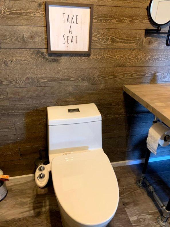 WOODBRIDGEE One Piece Toilet with Soft Closing Seat, Chair Height, 1.28 GPF Dual, Water Sensed, 1000 Gram MaP Flushing Score Toilet with Chorme Button, White,B0940-F-C customer photo 2